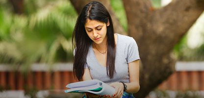 Student reading image Student reading image